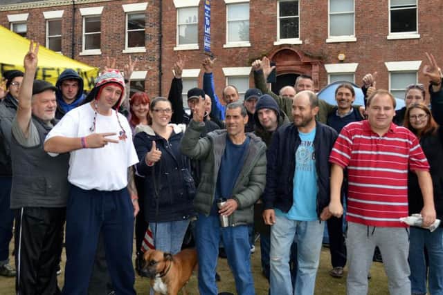 Campaigners and residents of 'Tent City' in Leeds celebrate after the council offered an alternative site. Picture: Dean Michaels Photography.