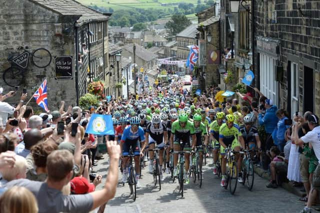 The 2014 Tour de France peloton races up Haworth - but will the 2019 World Championships in Yorkshire improve cycle safety?