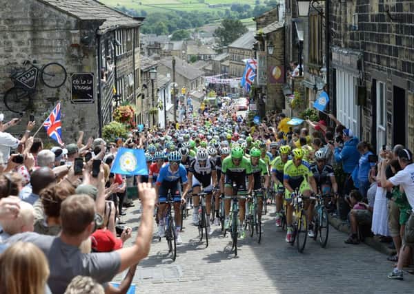 The 2014 Tour de France peloton races up Haworth - but will the 2019 World Championships in Yorkshire improve cycle safety?