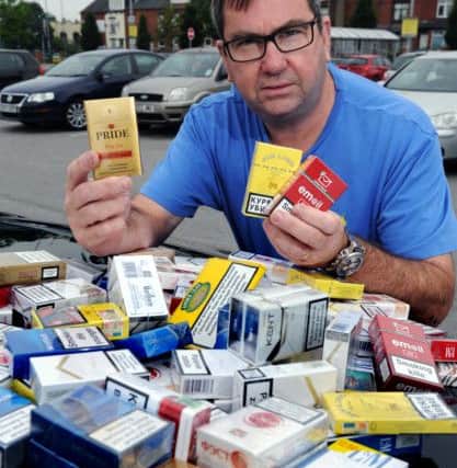 Former Scotland Yard officer Will O'Reilly was in Leeds, going round shops in the Harehills area looking for signs of illicit tobacco.
14th September 2016.
Picture : Jonathan Gawthorpe
