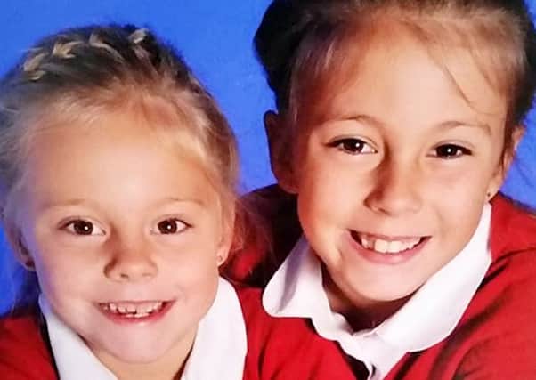 Mia Broadhead, 13, and sister Kiera, eight. Picture: Ross Parry Agency