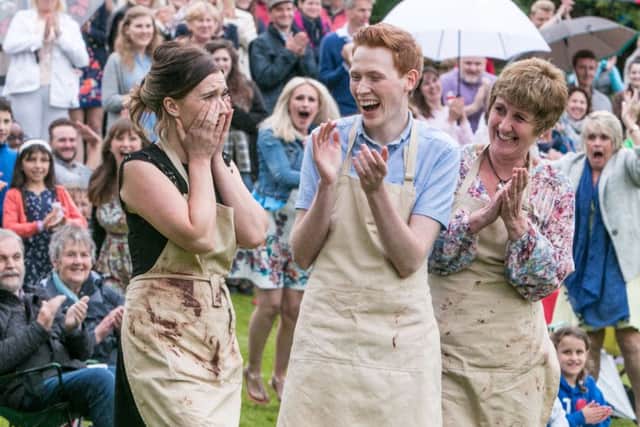 Jane Beedle (right), Andrew Smyth and Candice Brown, who has been crowned champion of this year's Great British Bake Off.