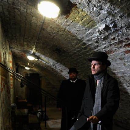 Sherlock Holmes, (Jason Durr)  and Inspector LeStrade (Victor McGuire) in the old prison cells beneath Leeds Town Hall filming a trailer for West Yorkshire Playhouse new production of Sherlock Holmes-Best Kept Secret. 
29 April 2013.
Picture Bruce Rollinson