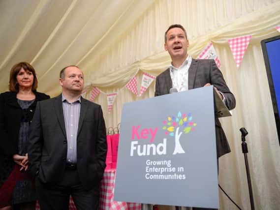Key Fund CEO Matt Smith announcing 10m of new funds to invest in community and social enterprises at its new offices in Sheffield. Looking on is Andy Simpson of Doncaster Refurnish centre and Nic Greenan of East Street Arts. Photo: Antony Oxley