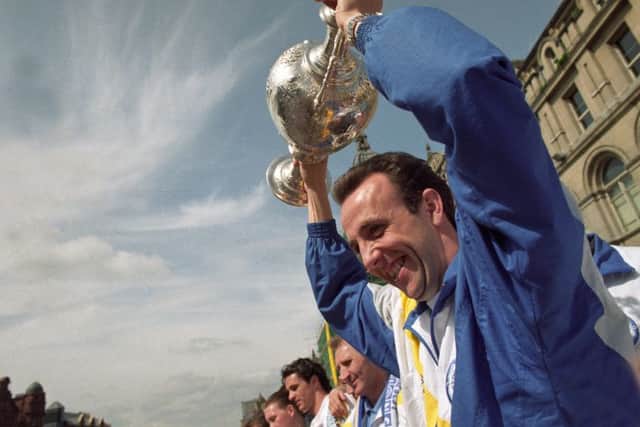 Gary McAllister holds the First Division Championship trophy.