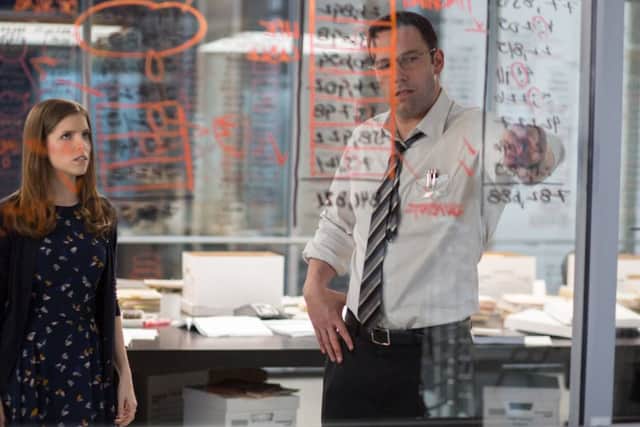 Undated Film Still Handout from The Accountant. Pictured: Ben Affleck as Chris Wolff and Anna Kendrick as Dana Cummings. See PA Feature FILM Reviews. Picture credit should read: PA Photo/Warner Bros. WARNING: This picture must only be used to accompany PA Feature FILM Reviews.