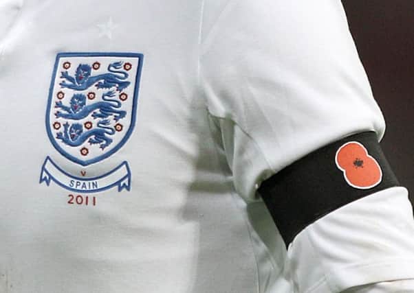 England players will wear the poppy on November 11.