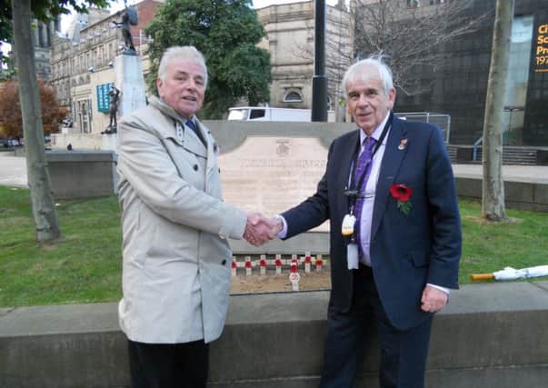 PAYING RESPECTS: Councillor Jim McKenna and Keith Loudon OBE, at the Victoria Cross memorial.