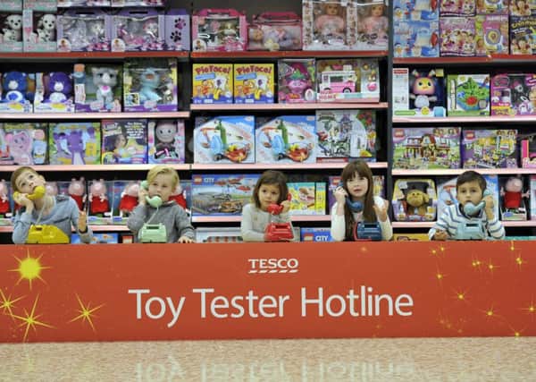 Kids rehearse for the Tesco Toy Tester Hotline, a dedicated phone service manned by children launching on 5th November to help stressed out parents pick the most loved toys for their kids this Christmas. 

This photo may only be used in for editorial reporting purposes for the contemporaneous illustration of events, things or the people in the image or facts mentioned in the caption. Re-use of the picture may require further permission from the copyright holder. Photo credit should read: Adrian Brooks/Imagewise
