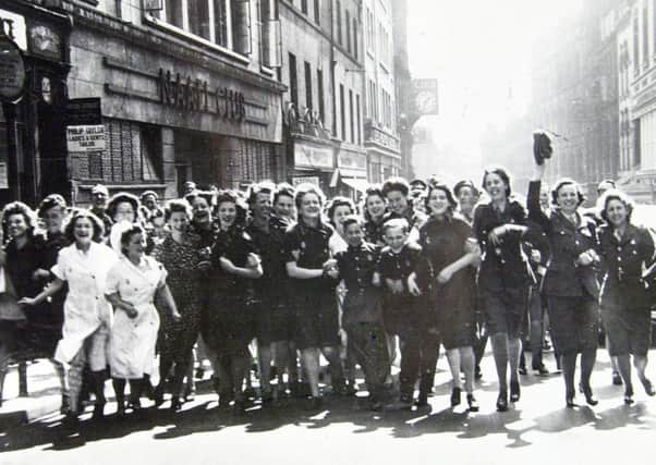 Revellers let their hair down in Albion Street, Leeds
VE Day