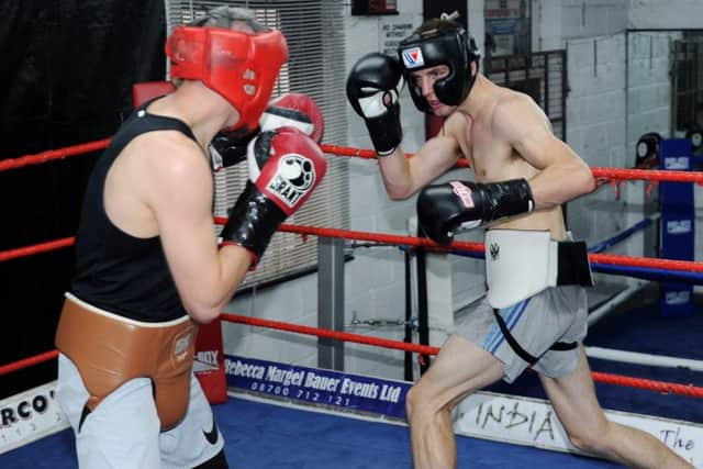 IBF Youth World Middleweight champion Reece Cartwright, right.