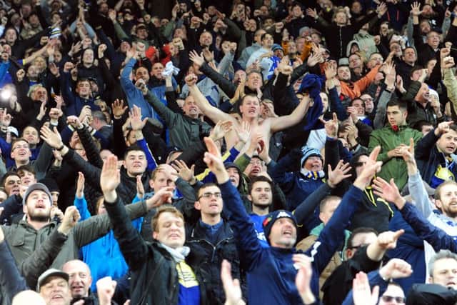 Leeds fans celebrate the win. Picture by Simon Hulme