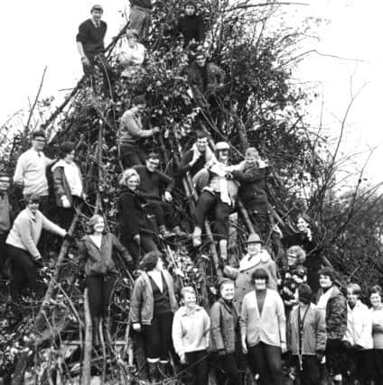 30th October 1966

Bonfire preparations at Creskeld Hall, home of Sir Malcolm Stodelarr-Scott.

Members of the Ripon Young Conservatives adding the final branches to the huge bonfire which will be lit by Mr. Edward Heath.