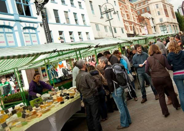 BUSTLING: The farmers market when it was held in Briggate.