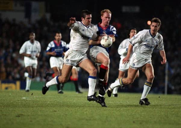 Eric Cantona and Lee Chapman on the charge for Leeds United against Glasgow Rangers in the European Cup in 1992.