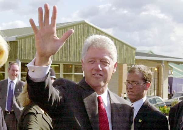 2001: Former President of the United States  Bill Clinton  surrounded by security people goes on a walkabout as he leaves the Yorkshire International Business Convention at the Great Yorkshire Showground in Harrogate.