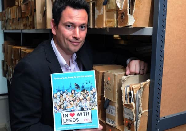 Grant Woodward with the 'In Love With Leeds' book celebrating 125 years of the Yorkshire Evening Post.
28th July 2016.
Picture : Jonathan Gawthorpe