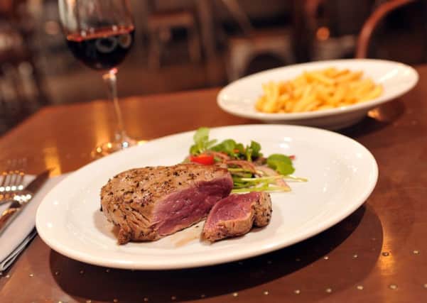 10oz fillet steak with skin on fries and salad. PIC: Tony Johnson