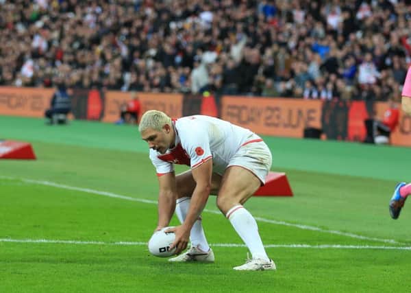 TOO LITTLE, TOO LATE: ELeeds Rhinos' Ryan Hall scores a late try against at London Stadium. Picture: Nigel French/PA