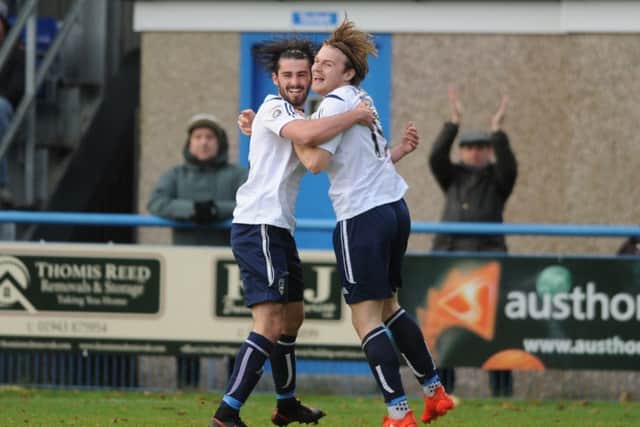 OPENING SALVO: Guiseley's Jordan Preston, right, celebrates his opening goal with Alex Purver. Picture: Tony Johnson.
