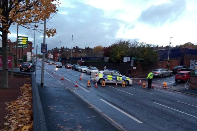 Police cars blocking the A65 Kirkstall Road in Leeds, near the scene of the accident. Picture: Gerard Binks