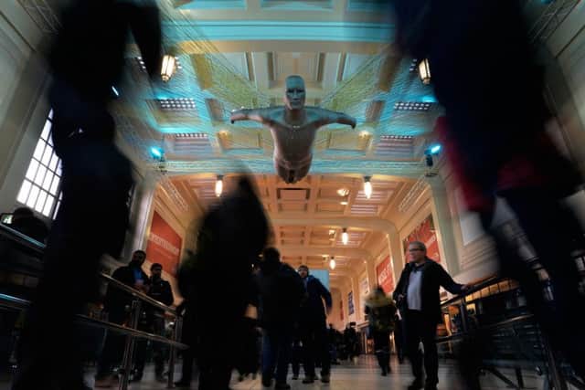 LeedsBIDs Christmas in Leeds Campaign, SPIRIT hovers above commuters as they progress through the railway station. The ethereal figure will shine a festive light as people rush and hurry through the season. NEWSUBSTANCE have created SPIRIT, a structure that will house 3,000 LED lights, use 10km of coloured string, it is 5 metres above the concourse and overall span is 24m x 14m. NEWSUBSTANCE are a UK studio specialising in dramatic, bespoke performance structures and have created pieces for Take That, Mumford & Sons and even the Beijing Olympics. .17 November 2016.  Picture Bruce Rollinson