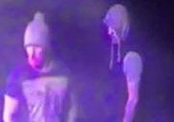 Police would like to speak to these two men following a robbery at a cash machine on Mayo Avenue in Bradford.