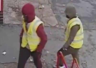 Police would like to speak to these two men in connection with a robbery on Stainbeck Road.