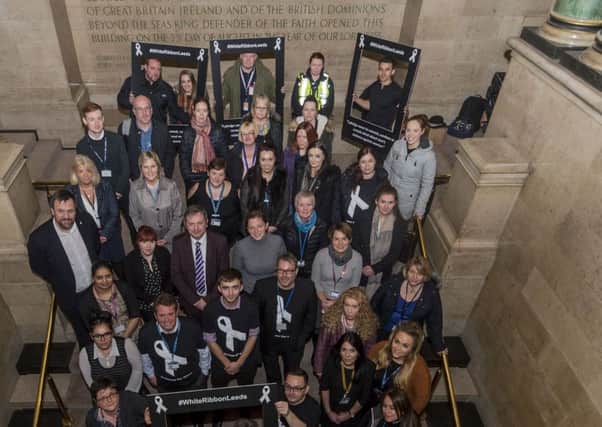 Date: 22nd November 2016. Picture James Hardisty.
Chief Executive Tom Riordan, and Cllr Lisa Mulherin, Leeds City Council. Exec Member Children & Family Services, supporting the White Ribbon Campaign for a challenge across Leeds, to encourage at least1000 men to show their support and pledge they will not commit, condone or remain silent about violence against women. Pictured Tom Riordan, and Lisa Mulherin, with White Ribbon ambassadors and volunteers who will be taking to the street of Leeds, at the launch held at Leeds Civic Hall.