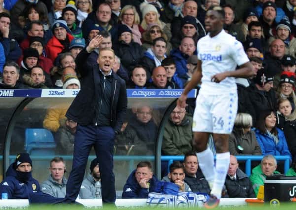 BACK IN? Should Leeds United head coach Garry Monk, left, put Hadi Sacko, right, back in his starting line-up? Picture by Jonathan Gawthorpe.