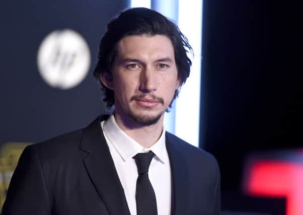 Adam Driver arrives at the world premiere of "Star Wars: The Force Awakens" at the TCL Chinese Theatre on Monday, Dec. 14, 2015, in Los Angeles. Driver plays the role of Kylo Ren in the film. (Photo by Jordan Strauss/Invision/AP)