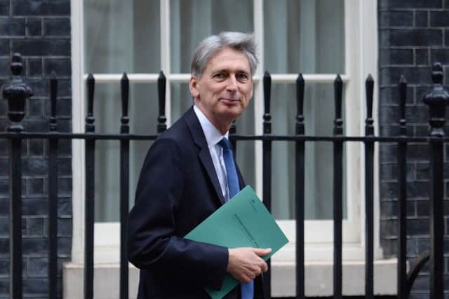 Chancellor Philip Hammond leaves 11 Downing Street
