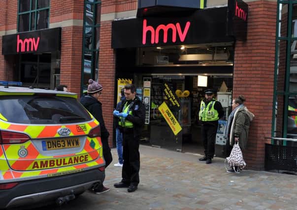 An off-duty officer was stabbed today at HMV in Lands Lane, Leeds. Picture: Tony Johnson.
