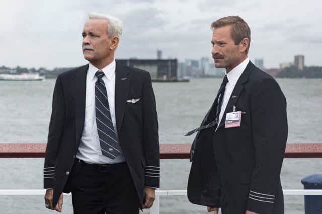 Undated Film Still Handout from Sully: Miracle On The Hudson. Pictured: Tom Hanks as Capt. Sully Sullenberger and Aaron Eckhart as Jeff Skiles. See PA Feature FILM Reviews. Picture credit should read: PA Photo/Warner Bros. WARNING: This picture must only be used to accompany PA Feature FILM Reviews.