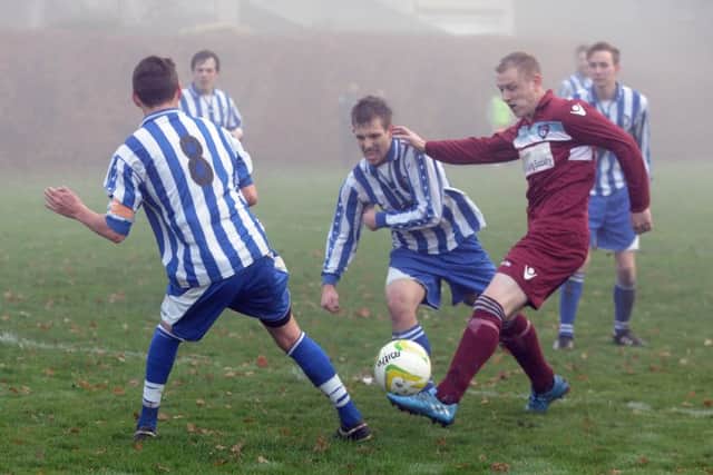 Ryan Gosney shoots for AFC Hosforth in their match against Altofts in West Yorkshire League Division 2.