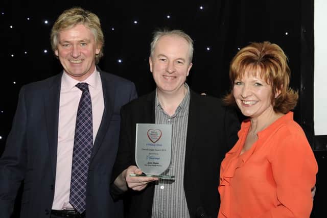 Overall Judges Award winner John Walsh from York Street Health Practice recieves his award from Russ Piper and Clare Frisby.
Yorkshire Evening Post Best of Health Awards 2015. Queens Hotel, Leeds.  7 December 2015.  Picture Bruce Rollinson