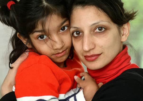 DISTRAUGHT: Shabnam Nazir with her daughter Amelia Qadeer.