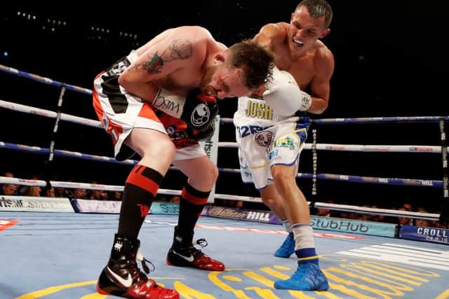 Josh Warrington (right) and Patrick Hyland during the WBC International Featherweight Championship bout at the First Direct Arena in Leeds this year. Picture: Danny Lawson/PA