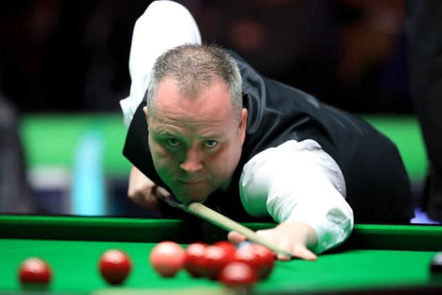 John Higgins during his match with Mark Selby.