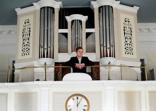 Rev Michael Newman pictured with the restored organ, at Fulneck Moravian Church, Fulneck, Pudsey...4th December 2016 ..Picture by Simon Hulme