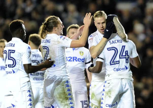 NIC WORK: Leeds United's Pontus Jannson congratulates Hadi Sacko for his part in Leeds' second goal against Aston Villa. Picture by Simon Hulme