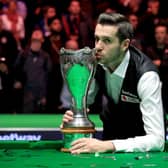 Mark Selby celebrates with the Betway UK Championship trophy after victory over Ronnie O'Sullivan at the York Barbican. Picture: Mike Egerton/PA.