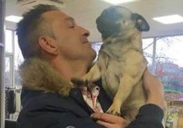 Puggy reunited with his owner Maurice Loscombe.