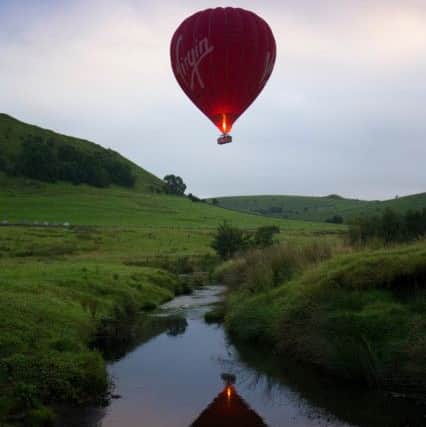20/09/16 

With the Autumn Equinox only a day away, a hot balloon is reflected in the river Dove as it launches on its last flight of the summer just after dawn above Parkhouse Hill in the Derbyshire Peak District.

All Rights Reserved: F Stop Press Ltd. +44(0)1773 550665   www.fstoppress.com