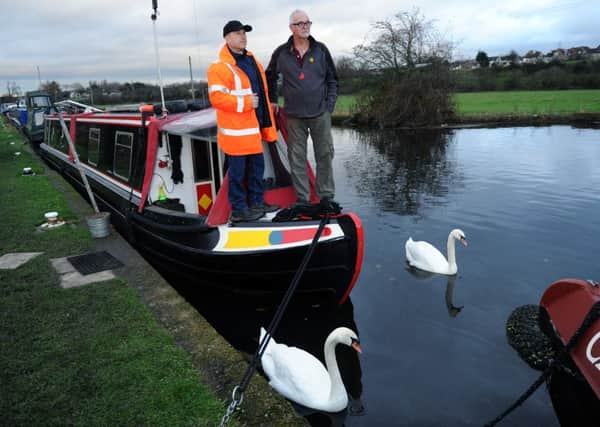 Trevor Wyatt and Andy Smith, left, have major concerns about diesel pollution on stretch of Calder and Hebble Canal at Wakefield.  PIC: Jonathan Gawthorpe