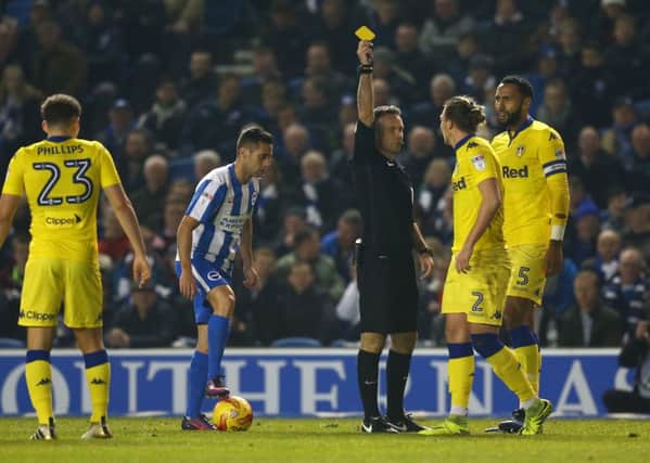 Luke Ayling's early yellow card set the tone at The Amex for Leeds, but Kalvin Phillips' red card and the subsequent penalty proved pivotal.