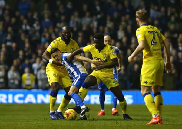 Brighton and Hove Albion's Anthony Knockaert and Leeds United's Ronaldo Vieira battle for the ball.