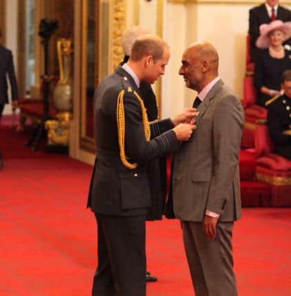Hanif Malik from Leeds is made an OBE (Officer of the Order of the British Empire) by The Duke of Cambridge at Buckingham Palace.