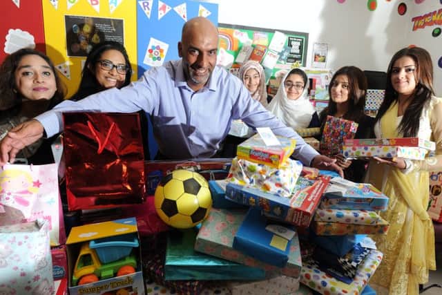 Hanif Malik with volunteers who collected gifts for children at Leeds General Infirmary as part of Ramadan