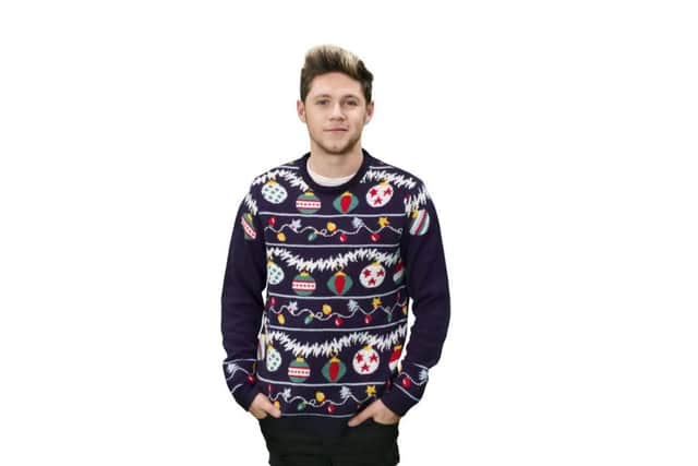 Niall Horan sports a festive knit in support of Save the Children.